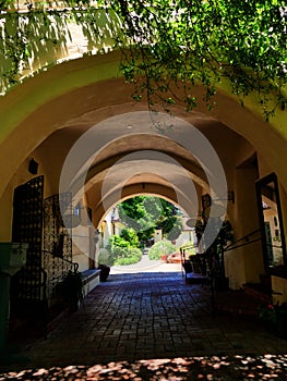 Hacienda style Mexican architecture corridor opening toward courtyard