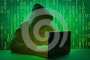 Hacker attack. Computer hacker coding on keyboard. Hacker working on code on dark green digital background. hacker virus malware