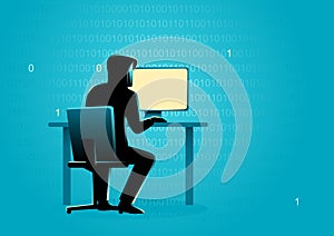 Hacker behind desktop computer