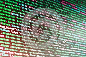 Hacker breaching net security. Source code close-up.