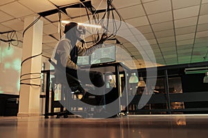 Hacker breaking into computer system in vr, hacking database