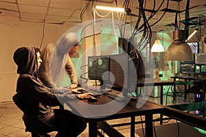Hacker breaking into internet network system, coding computer worm