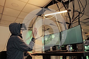 Hacker coding script in vr headset