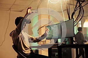 Hacker coding in vr helmet, hacking server in metaverse
