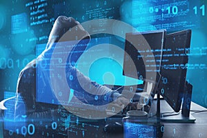 Hacker at desktop using computer with abstract glowing blue coding background. Binary code, theft, technology, data and internet