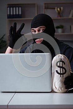 The hacker hacking computer late at night