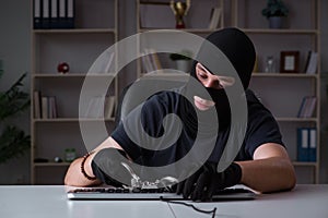 The hacker hacking computer late at night