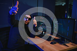 Hacker is hacking into the computer network. Computer criminal