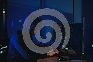 Hacker is hacking into the computer network. Computer criminal