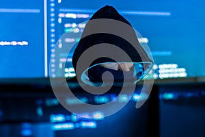 Hacker hacking computer password at night