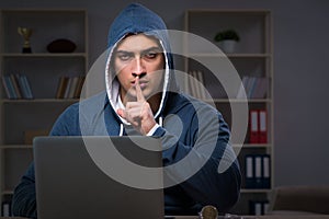 The hacker hacking the data late at night