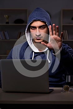 The hacker hacking the data late at night