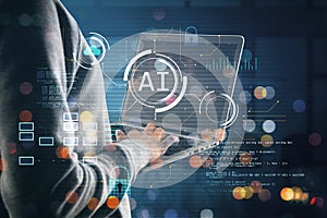 Hacker hands using laptop with glowing blurry ai hologram with binary coding on blurry background. Artificial intelligence,