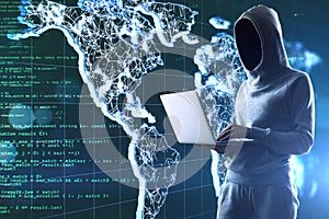 Hacker holding laptop and glowing world map