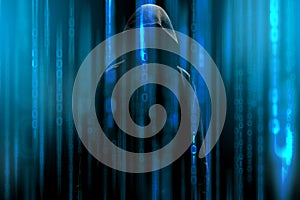 Hacker with a hood and blue binary code matrix. Hacking the confidential data.