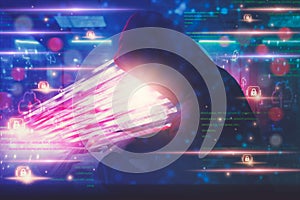 Hacker in hoodie attack laptop computer,dangerous data server and Infects system, binary code digital,hacking and malware