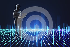 Hacker with laptop standing on creative metaverse background. Digital future, data hacking and cyberpunk concept