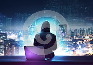 Hacker man with anonymous mask using laptop to hacking in the top building AI Generative photo