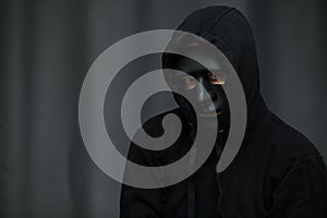 Hacker in mask,cybersecurity,network protection from hacking