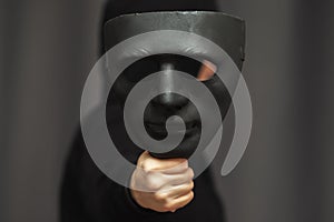 Hacker in mask,protection of personal data identity from theft and hacking in network