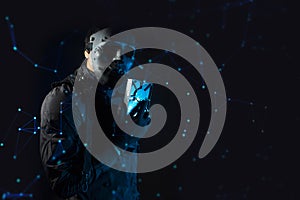 hacker robbery terrorist holding the harddisk of virus computer attack to server network