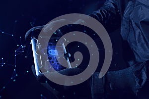 hacker robbery terrorist with tablet smartphone computer attack