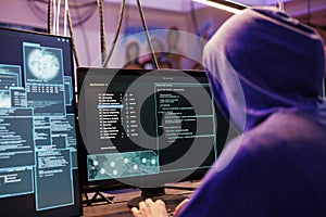 Hacker running illegal malware on screen