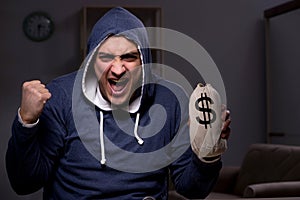 The hacker with sack of money