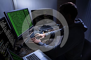 Hacker Stealing Information From Multiple Computers