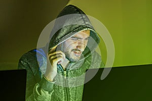 Hacker talking on the phone