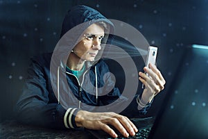 Hacker is trying to hack into the phone using the personal identification method of face recognition