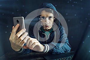 Hacker is trying to hack into the phone using the personal identification method of face recognition