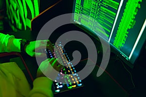 Hacker using computer malware software and hacking binary code digital interface.