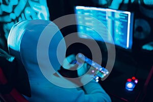 Hacker using computer malware software and hacking binary code digital interface.