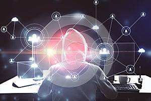 Hacker using computer with social network interface