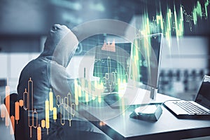 Hacker using computer with stock chart and  business statistics hologram
