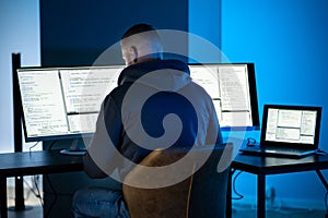 Hacker Using Computer To Write Exploit