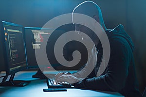 Hacker using computer virus for cyber attack