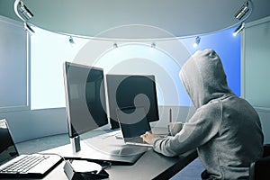 Hacker using computers side