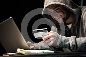 Hacker using laptop