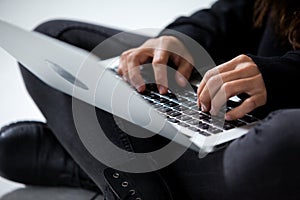 Hacker using a laptop