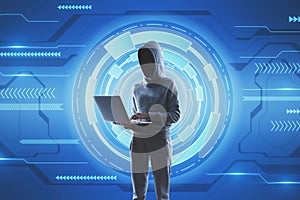 Hacker using laptop on creative hi-tech background. Hacking, technology and malware concept
