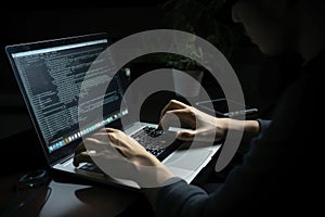 Hacker using laptop in a dark room at night. Programmer working on computer. A software engineer coding on a laptop, AI Generated