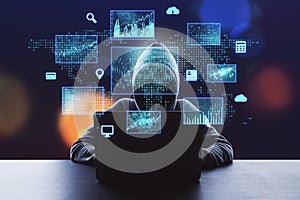 Hacker using laptop with digital finance and data protection interface