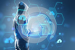 Hacker using laptop with glowing hexagonal cloud computing hologram with binary coding on blurry background. Safety, hacking,