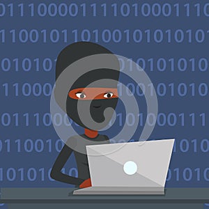 Hacker using laptop to steal information.