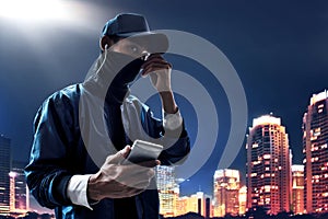 Hacker using mobile phone