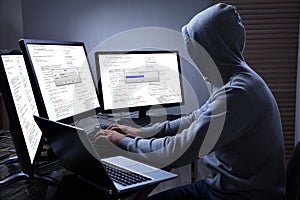 Hacker Using Multiple Computers For Stealing Data