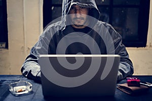 Hacker working on computer cyber crime