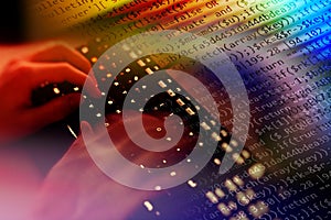 Hacker writing malicious code